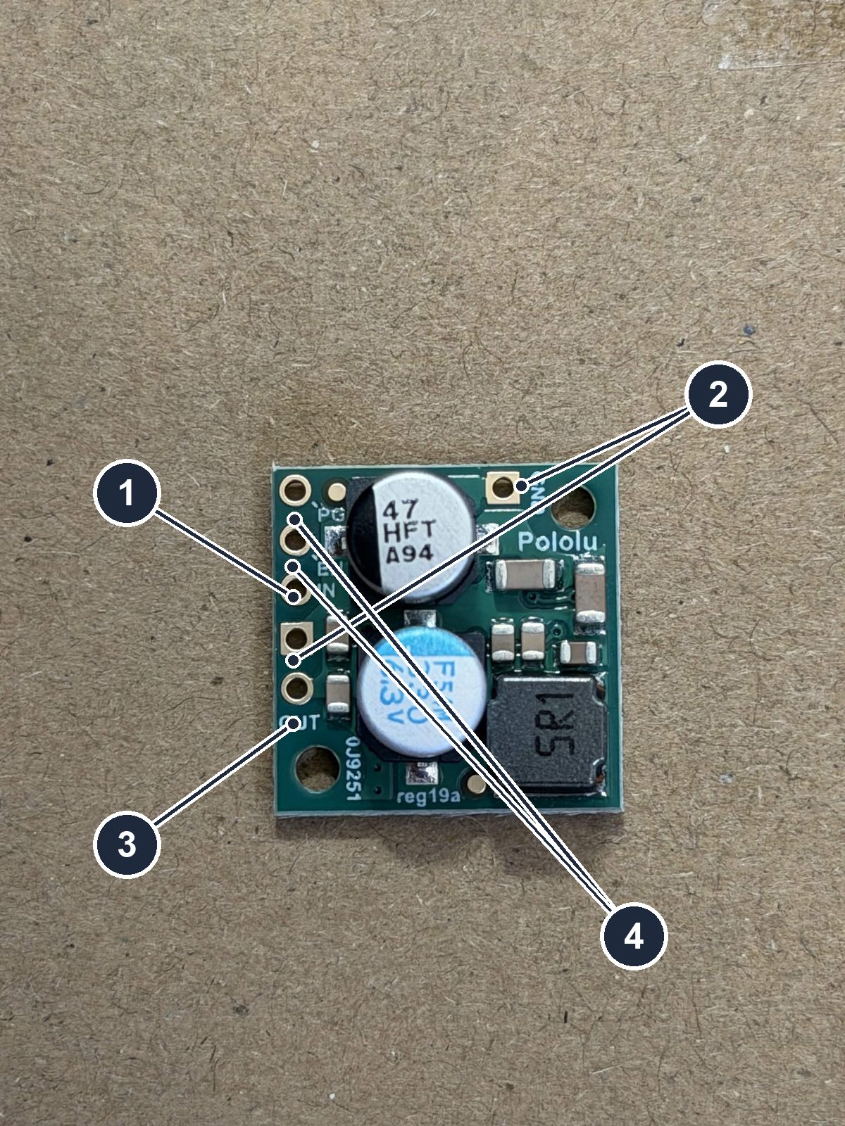 The Pololu 5 V step-down regulator, bare, pin row along its left edge